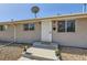 Charming home featuring a secure front door and a welcoming entrance with potted flowers at 4812 W 8Th Ave, Denver, CO 80204