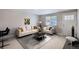 Bright living room featuring neutral walls, large window, stylish furniture, and modern decor at 4812 W 8Th Ave, Denver, CO 80204