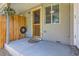 This patio features a privacy wall, window, and a door to access the outside of the home at 4812 W 8Th Ave, Denver, CO 80204