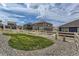 Backyard with low maintenance gravel and grass area at 4815 Cattle Cross Rd, Castle Rock, CO 80104
