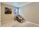 Bedroom featuring neutral walls, carpet, and a comfort massage chair at 4815 Cattle Cross Rd, Castle Rock, CO 80104