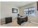 Office space with a desk, chair, filing cabinet, and window with neighborhood views at 4815 Cattle Cross Rd, Castle Rock, CO 80104