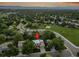 Aerial view of a home nestled among lush trees, showcasing its location in a serene neighborhood at 6359 S Locust Way, Centennial, CO 80111