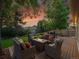 Relaxing backyard deck with comfortable seating and a fire pit, great for entertaining guests at 6359 S Locust Way, Centennial, CO 80111
