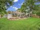 Spacious backyard with a large composite deck, and lush landscaping at 6359 S Locust Way, Centennial, CO 80111