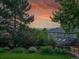 Beautiful landscaped backyard with lush greenery and a serene atmosphere, ideal for outdoor enjoyment at 6359 S Locust Way, Centennial, CO 80111