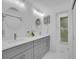 Elegant bathroom with double sinks, modern fixtures, and a glass-enclosed shower at 6359 S Locust Way, Centennial, CO 80111