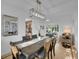 Elegant dining room with stylish chandelier and ample space for entertaining at 6359 S Locust Way, Centennial, CO 80111