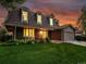 Charming home with manicured lawn, mature landscaping and an attached two car garage at 6359 S Locust Way, Centennial, CO 80111