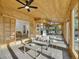 Large sunroom with wooden ceilings, tiled floor, hot tub and lots of natural light at 6359 S Locust Way, Centennial, CO 80111