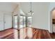 Charming dining area with hardwood floors and sliding glass doors at 2121 S Troy Way, Aurora, CO 80014