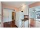 White kitchen cabinets, granite countertops and stainless steel appliances at 2121 S Troy Way, Aurora, CO 80014
