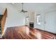 Living room with hardwood floors, fireplace and access to a patio at 2121 S Troy Way, Aurora, CO 80014