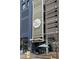 Street view of The Colo Radan apartments entrance with architectural details at 1750 Wewatta St # 700, Denver, CO 80202