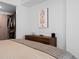 Spacious bedroom showcases a sleek dresser and walk-in closet, perfect for organized living and style at 1750 Wewatta St # 700, Denver, CO 80202