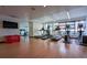 Well-equipped gym with treadmills, elliptical machines, and views of the city at 1750 Wewatta St # 700, Denver, CO 80202