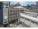 View of The Colo Radan apartments near the train station platforms at 1750 Wewatta St # 700, Denver, CO 80202