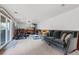 Home gym and living area featuring a large window with winter outdoor views at 2857 Hiwan Dr, Evergreen, CO 80439