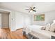 Bedroom featuring natural light, hardwood floors, and closet at 6320 E Asbury Ave, Denver, CO 80224