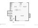 First floor plan showcasing the kitchen, dining room, living room with fireplace, foyer, and entry at 6320 E Asbury Ave, Denver, CO 80224