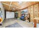 The spacious garage provides ample storage, shelving, and room for vehicles and projects at 6320 E Asbury Ave, Denver, CO 80224