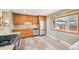 Bright kitchen featuring stainless steel appliances, granite countertops, and ample storage at 6320 E Asbury Ave, Denver, CO 80224