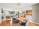 Open concept living space features hardwood floors, fireplace, and modern furnishings at 6320 E Asbury Ave, Denver, CO 80224