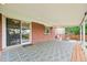 The covered patio has string lights and offers a relaxing outdoor space at 6320 E Asbury Ave, Denver, CO 80224