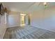Neutral bedroom with plush carpeting, and an attached bathroom at 8164 Flower Cir, Arvada, CO 80005