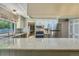 Kitchen with granite countertops, a stainless-steel refrigerator, and updated cabinets at 8164 Flower Cir, Arvada, CO 80005