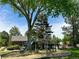 Community playground with slide and picnic tables at 8164 Flower Cir, Arvada, CO 80005