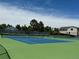 Community tennis court and blue sky at 8164 Flower Cir, Arvada, CO 80005