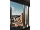 Stunning city view from a large window, showcasing the urban landscape on a clear day at 1133 14Th St # 1820, Denver, CO 80202