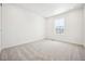 Bright bedroom with a window and plush carpeting; ideal for comfort and relaxation at 39720 Congress Ln, Elizabeth, CO 80107