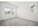 Bright bedroom featuring three windows that provide ample natural light at 39720 Congress Ln, Elizabeth, CO 80107