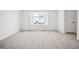 Spacious bedroom with an exterior view and a closet door at 39720 Congress Ln, Elizabeth, CO 80107