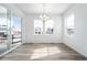 Inviting dining area with large windows, offering a lovely view and ample natural light at 39720 Congress Ln, Elizabeth, CO 80107
