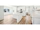Well-equipped kitchen with stainless steel appliances, white cabinets, and stylish backsplash at 39720 Congress Ln, Elizabeth, CO 80107