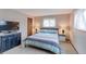 Cozy bedroom featuring neutral walls, a comfortable bed, and soft lighting at 10679 Union Way, Broomfield, CO 80021
