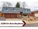 Charming two-story brick home with a two-car garage and a well-maintained front yard at 10679 Union Way, Broomfield, CO 80021
