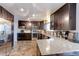 Well-appointed kitchen with stainless steel appliances, granite countertops, and ample storage at 10679 Union Way, Broomfield, CO 80021