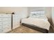 Well-lit bedroom features two dressers and a window at 12708 Tamarac St, Thornton, CO 80602