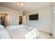 Spacious bedroom is equipped with a tv, carpeted floors, and a serene atmosphere at 12708 Tamarac St, Thornton, CO 80602