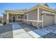 Single-story home with covered entry, stone accents, and a spacious two-car garage in a well-kept community at 12708 Tamarac St, Thornton, CO 80602