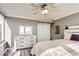 Bedroom featuring wood floors, dresser with mirror, and ample natural light at 789 N Clarkson St # 705, Denver, CO 80218