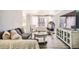 Bright living room with sleek hardwood floors, stylish seating, and ample natural light at 789 N Clarkson St # 705, Denver, CO 80218