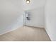 Clean bedroom with neutral carpet, a sliding door closet, and natural light at 12742 E 104Th Dr, Commerce City, CO 80022