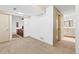 Finished basement area, leads to bathroom and another room at 7624 S Cove Cir, Centennial, CO 80122