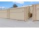 Attached garage and driveway in winter snow with house number at 7624 S Cove Cir, Centennial, CO 80122