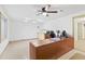 Home office space with ample desk area, neutral colors and tile flooring at 7624 S Cove Cir, Centennial, CO 80122